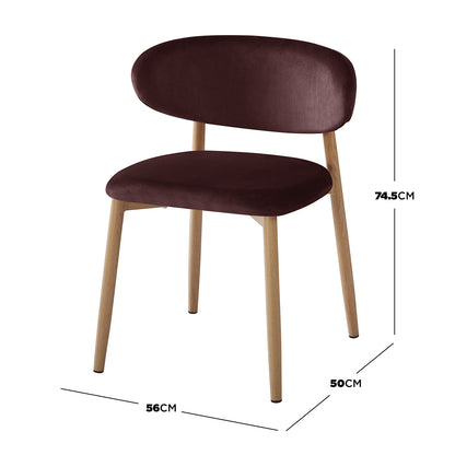 Audrey Fabric Dining Chair Set of 2 in Dark Plum features a cushioned, velvet-look seat with a low backrest, supported by four tapered light-wood legs, perfect for modern dining spaces.