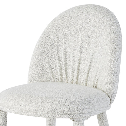 The Joren Boucle Arched Dining Chair Set of 2 in Cream showcases a modern curved back and seat in white loop-textured fabric, highlighting its plush cushioning and simple metal leg.