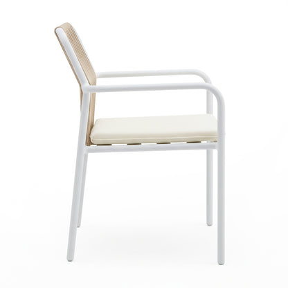 Side view of dining chair with white metal frame and light wood back on white background