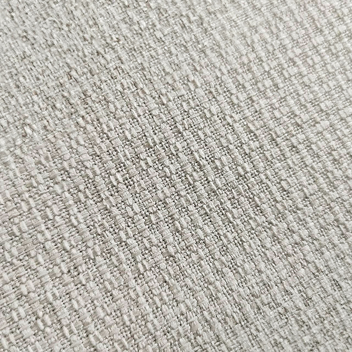 Close-up of light woven upholstery fabric texture.