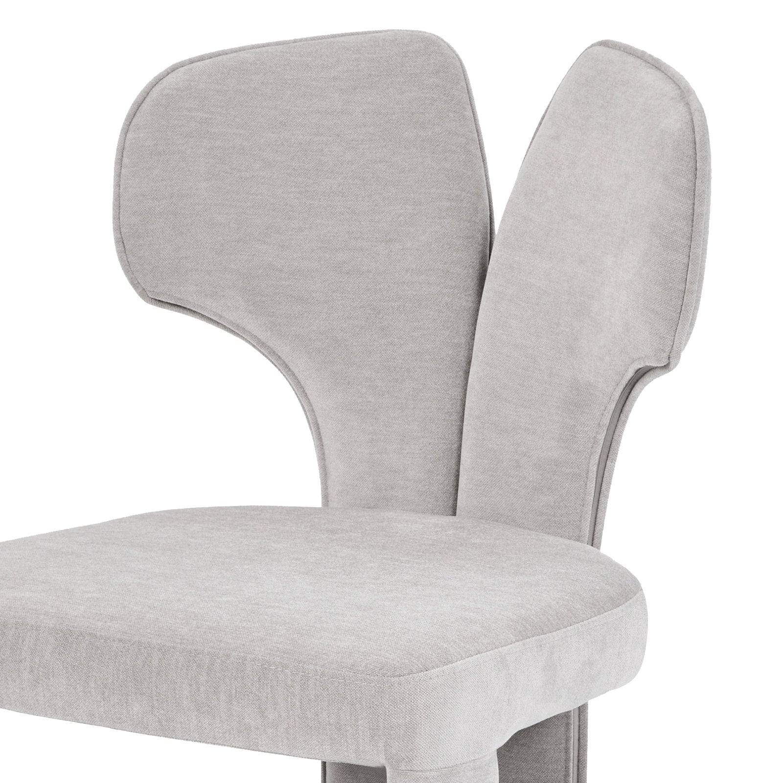 Close-up of the upper backrest and seat of a light gray chair on white background