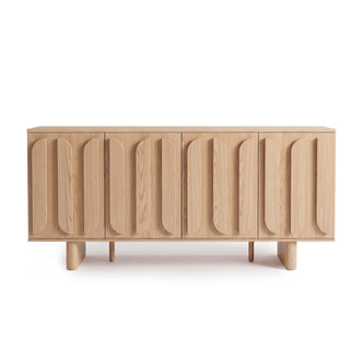 Light wood sideboard with sculptural vertically patterned front doors on a white background