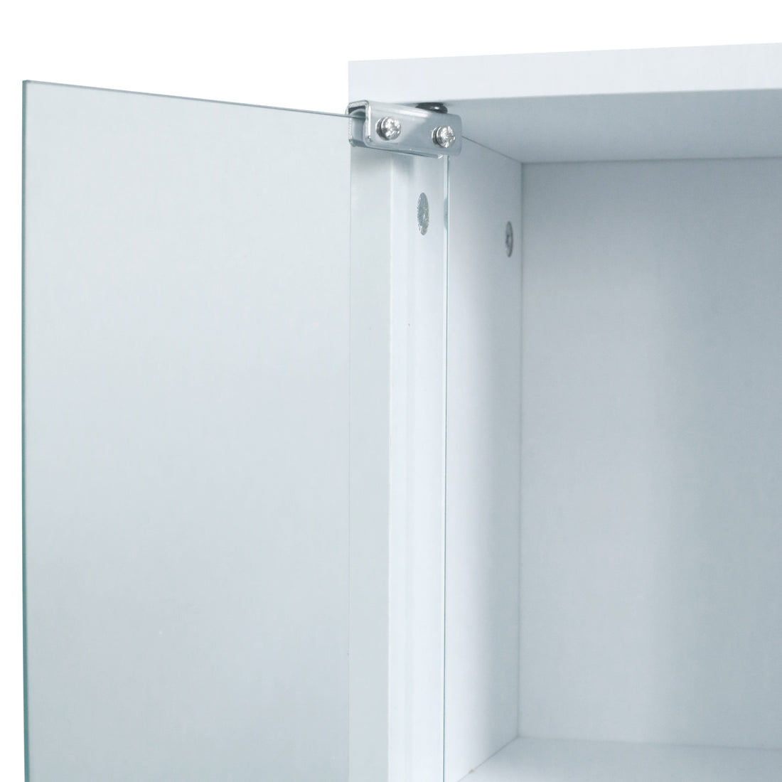 Close-up of mirrored cabinet hinge and interior corner