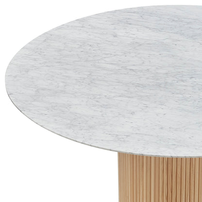 Gracie 120cm Round Marble Dining Table in Natural, featuring a white marble top with unique veining and a light-wood fluted pedestal base, offering a blend of elegance and stability.