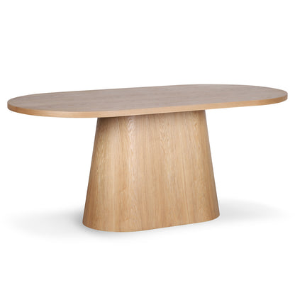 Gigi 180cm Oval Wooden Dining Table in Oak features a light-wood oval tabletop with a tapered pedestal base, offering a stylish, spacious design perfect for enhancing dining areas.