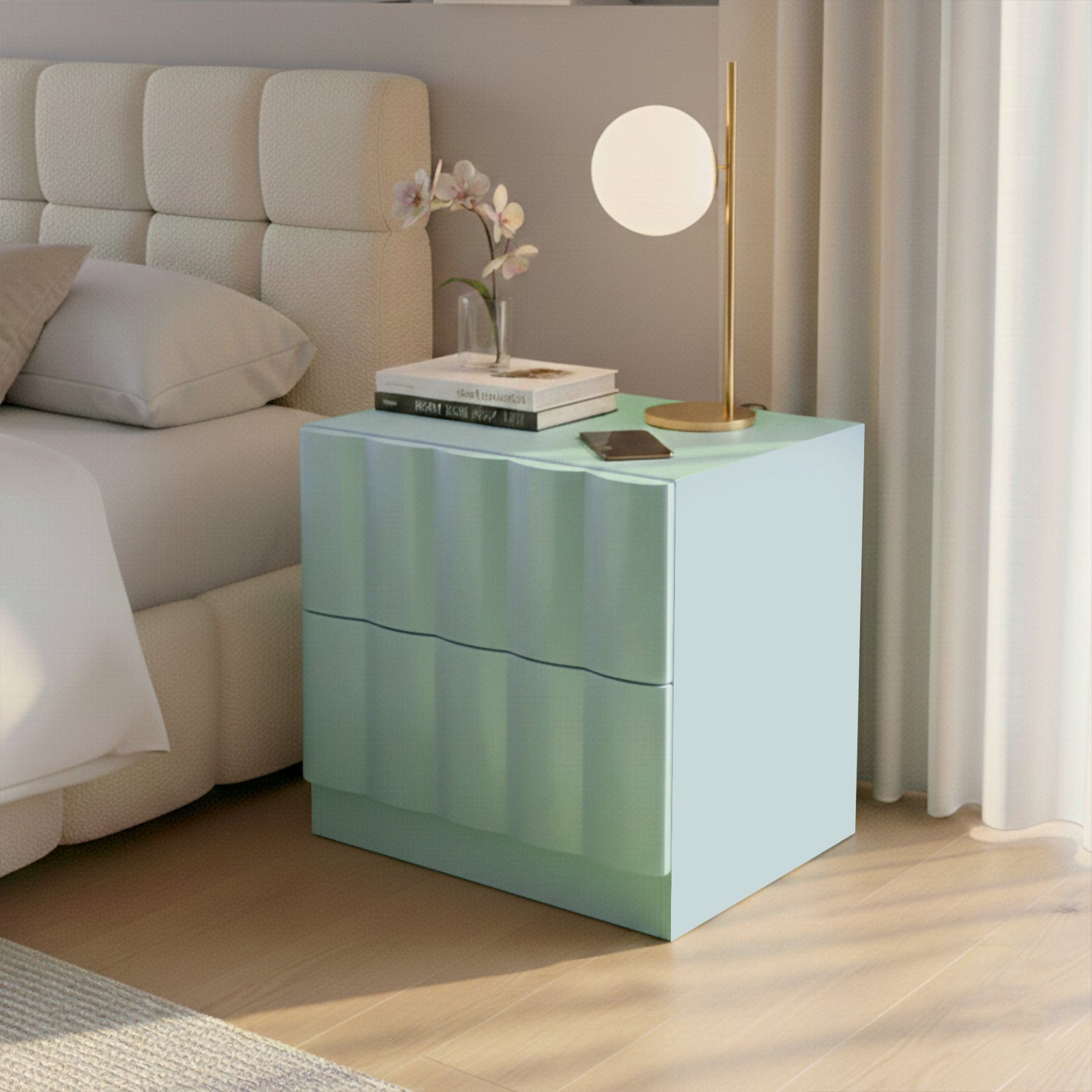 Pastel green nightstand next to bed in a furnished bedroom with lamp and vase of flowers