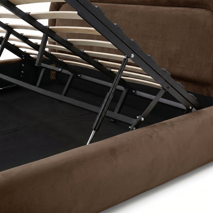 Close-up of the hydraulic lift mechanism and storage compartment inside an upholstered bed