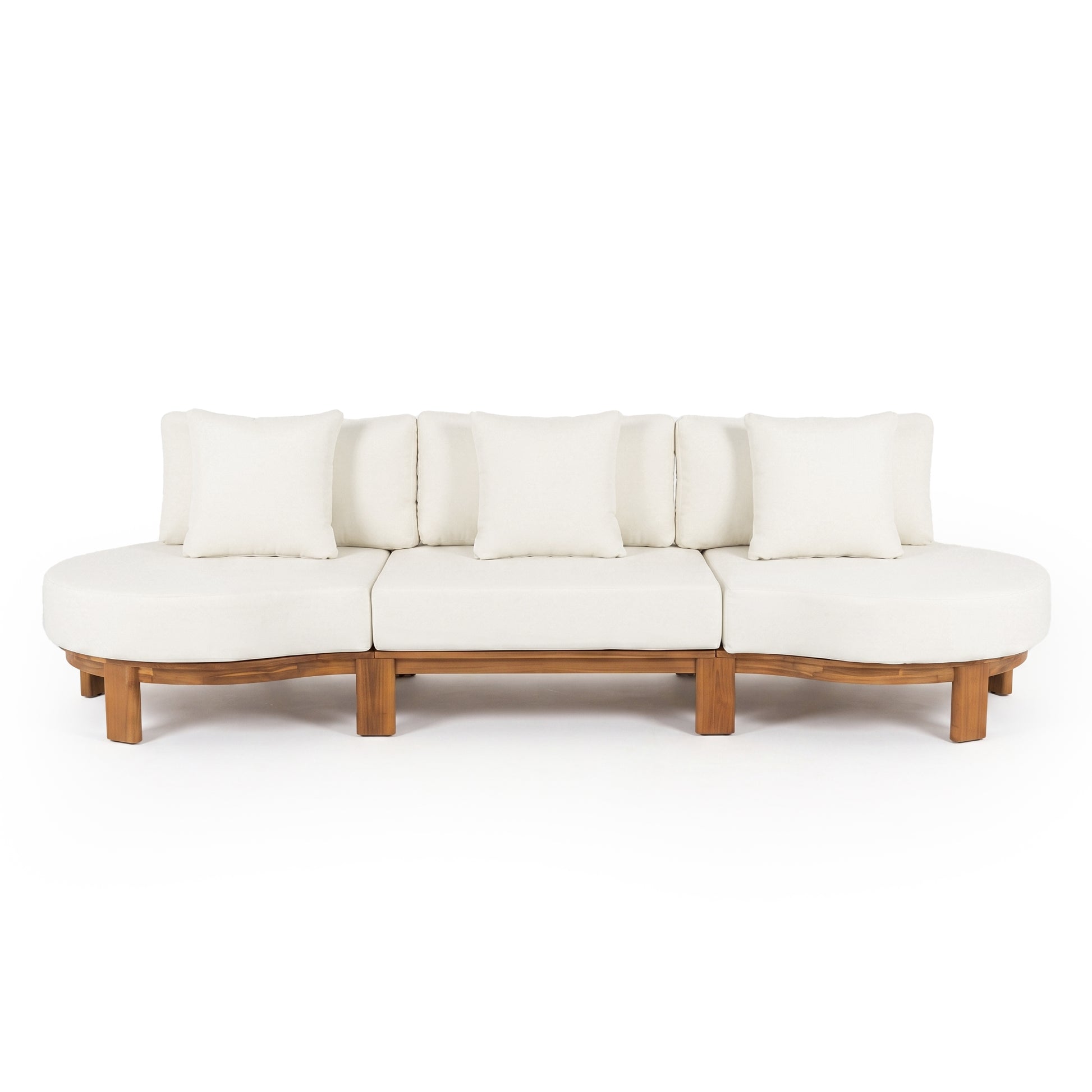 Modern white sofa with wooden base and five back cushions on a white background.