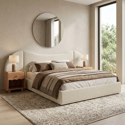 Upholstered bed in a styled bedroom with nightstands and decor