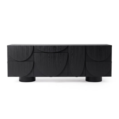 Modern black sideboard with geometric front design on a white background