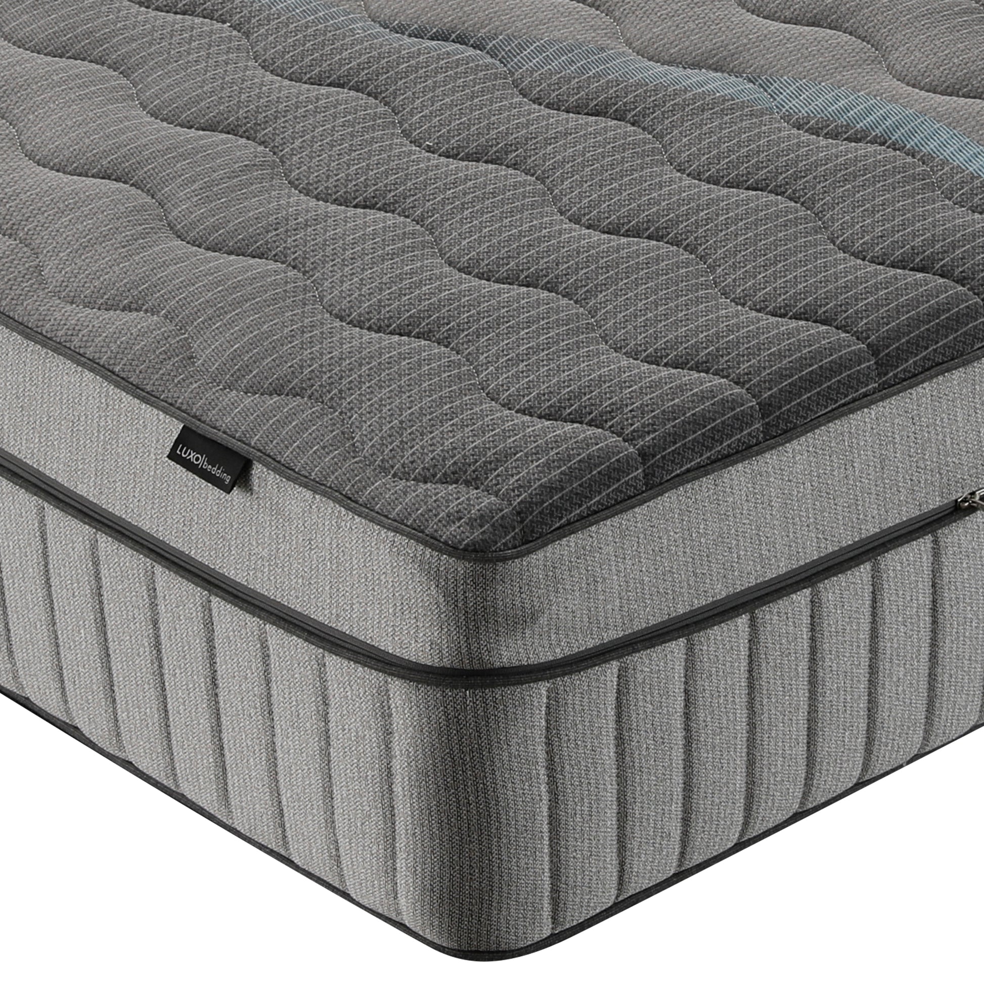 Close view of mattress corner and side on white background