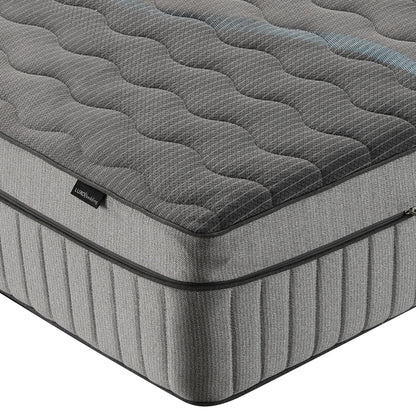 Close view of mattress corner and side on white background