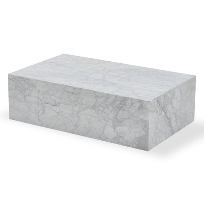 Solene 100cm Coffee Table in Carrara, a rectangular marble slab with unique veining, showcases elegance and practicality, set against a plain backdrop, embodying modern luxury and refined sophistication.