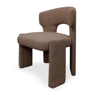Lunari Bouclé Curved Accent Chair in Brown featuring a textured fabric, low curved backrest with arch cut-out, thick padded seat, and four blocky legs, offering a stylish, cozy seating solution.