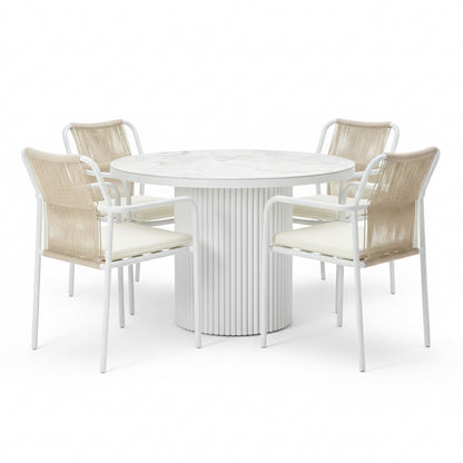Evone 4 Seater Stone Outdoor Dining Table Set in Natural features a round, marble-look tabletop and four chairs with tan-rope backrests and light cushions, perfect for a modern patio.