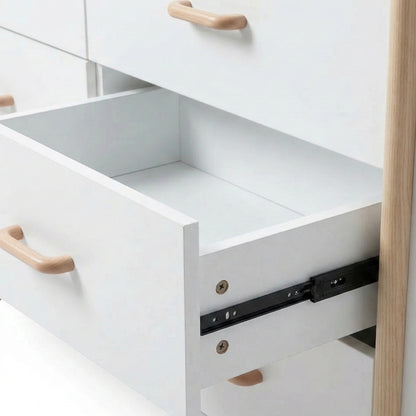 Close-up of open dresser drawer showing interior and slide mechanism on white background