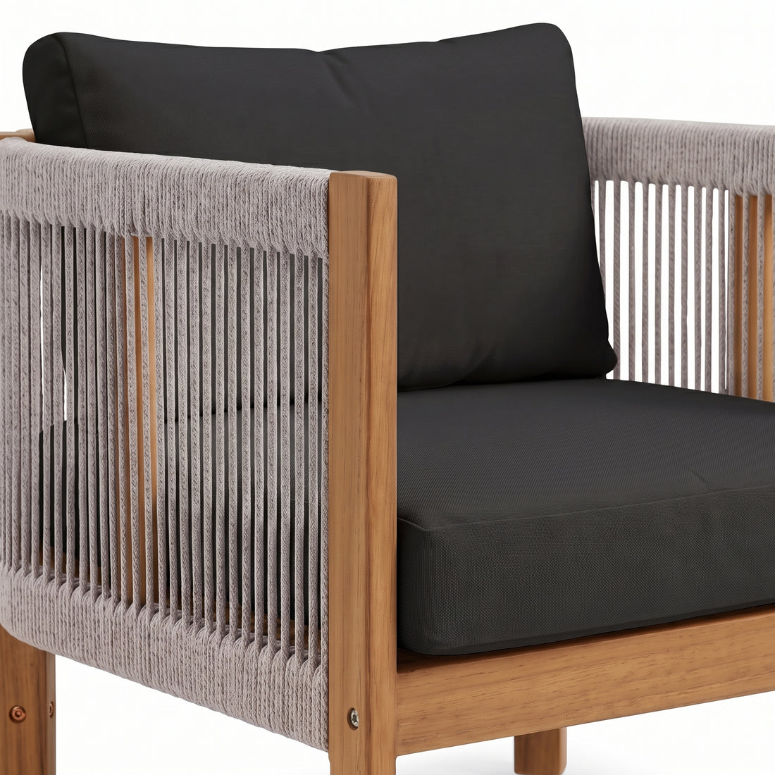 Close-up of a modern armchair corner with cushions and rope detailing on a white background