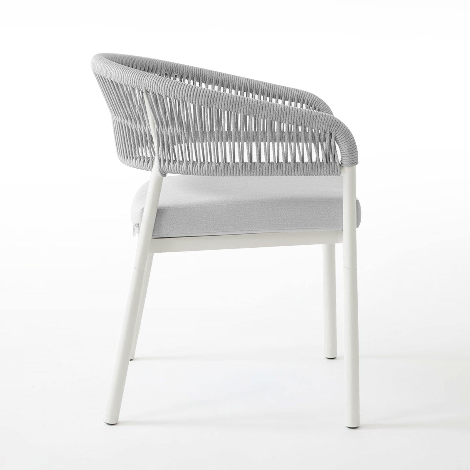 Coastal Outdoor Rope Dining Chairs Set of 2 in White, featuring light-grey woven rope backrest, slim metal frame, cushioned seat, and straight white metal legs, embodying minimalist Scandinavian style.
