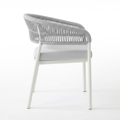 Coastal Outdoor Rope Dining Chairs Set of 2 in White, featuring light-grey woven rope backrest, slim metal frame, cushioned seat, and straight white metal legs, embodying minimalist Scandinavian style.