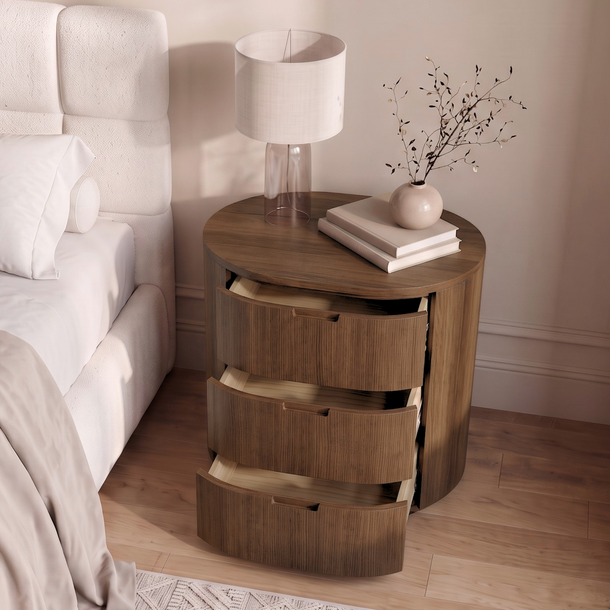 Round wooden nightstand with open drawers styled in a bedroom