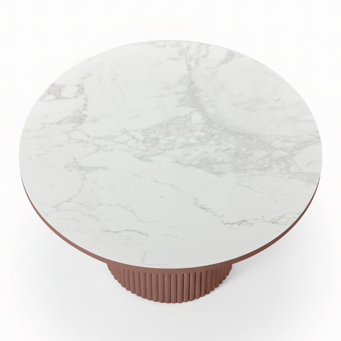 Evone Aluminium Outdoor Dining Table in Terracotta features a round white marble-look top with gray veining and a reddish-brown ribbed cylindrical base, showcasing a modern design against a plain backdrop.