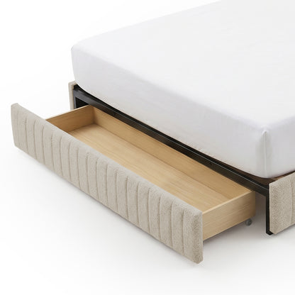 Close-up of bed corner with pull-out storage drawer on a white background