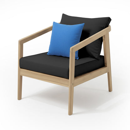 Delva 4 Seater Hardwood Acacia Outdoor Sofa Set in Black, featuring a modern armchair with light-wood frame, thick black cushions, and a blue throw pillow, highlighting sleek, contemporary outdoor elegance.