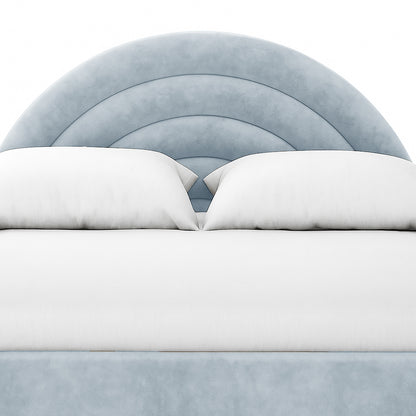 Estilla Velvet Rainbow Bed in Ice Blue, featuring a soft velvet headboard with arch-shaped panels, white linens, and two propped pillows, creating a cozy and stylish bedroom atmosphere.