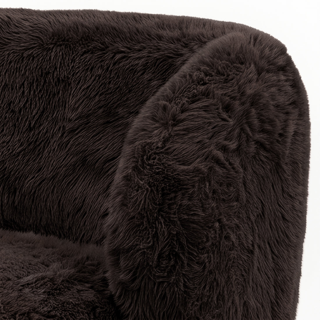 Close-up of a chocolate brown faux fur upholstered accent chair section on a white background