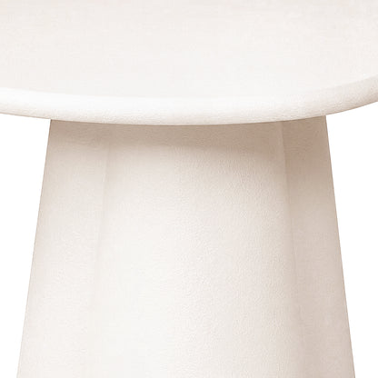 Close-up of a white sculptural furniture base and lower edge of the top on a white background