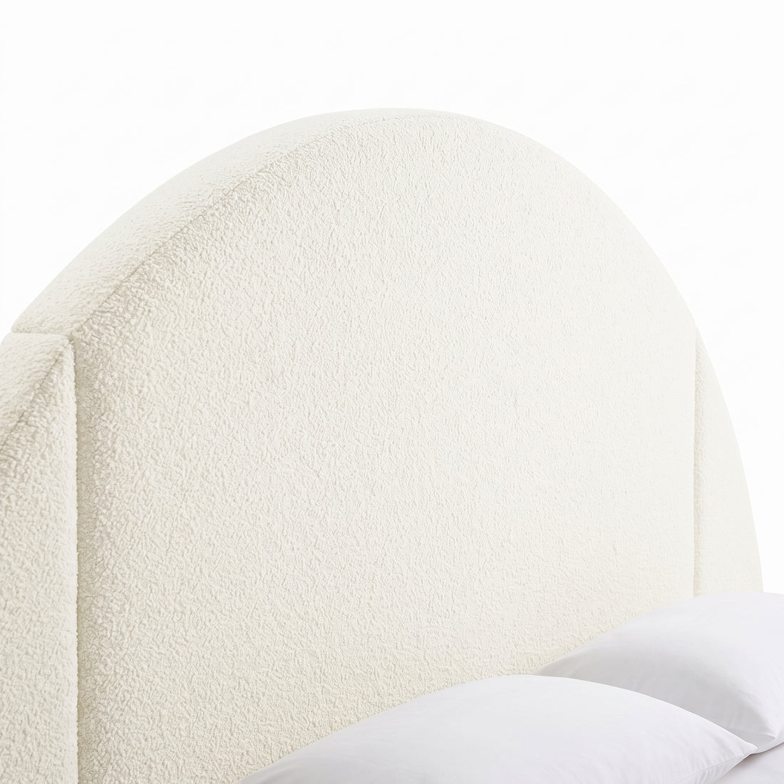 Close-up of an upholstered headboard on a white background
