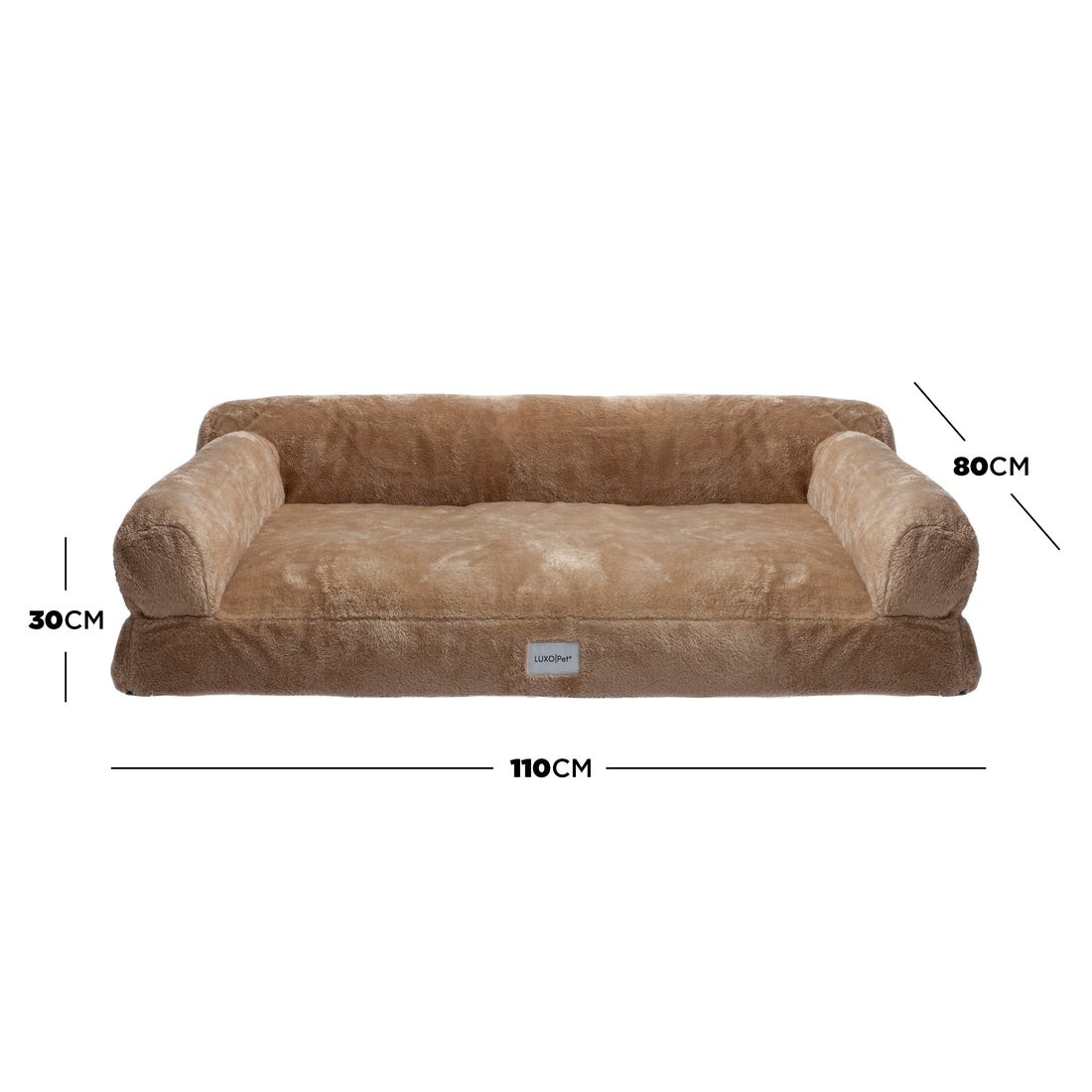 Plush tan dog bed with bolsters and dimensions marked on white background