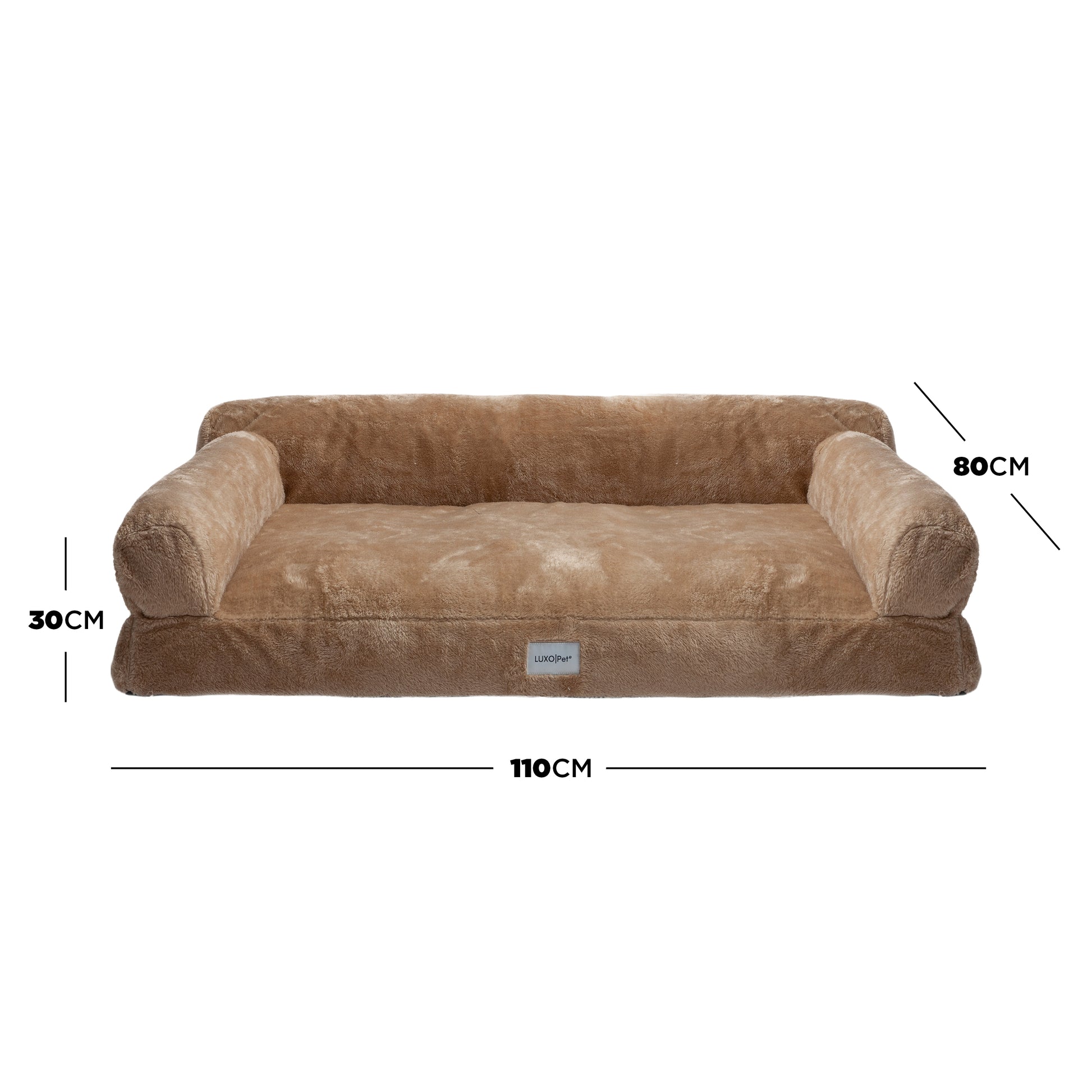 Plush tan dog bed with bolsters and dimensions marked on white background