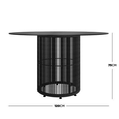 Vellora 4 Seater Wicker Outdoor Dining Set in Black featuring a round dining table with a black tabletop and sculptural cylindrical base, highlighting its modern design on a white background.