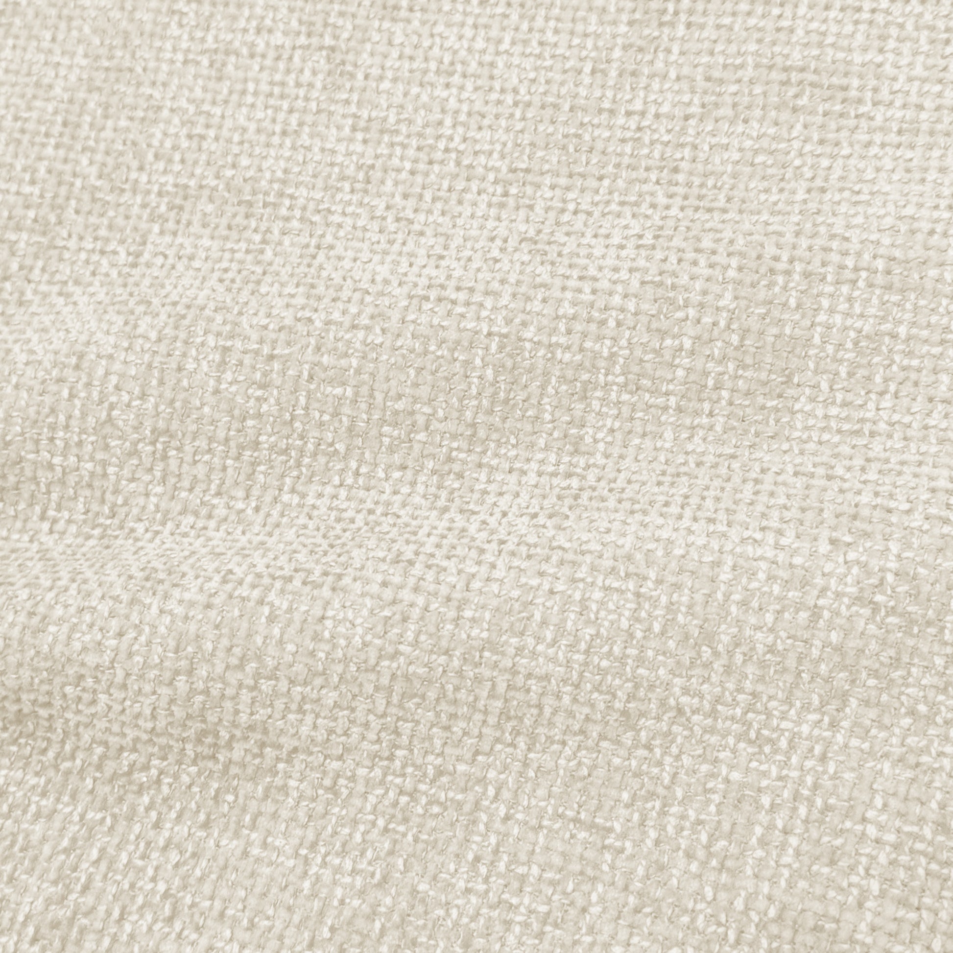Close-up of cream woven upholstery fabric texture