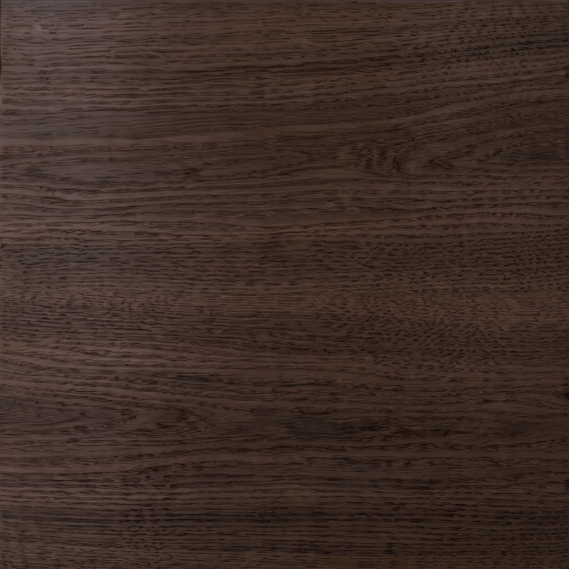 Close-up of dark brown wood grain surface detail.