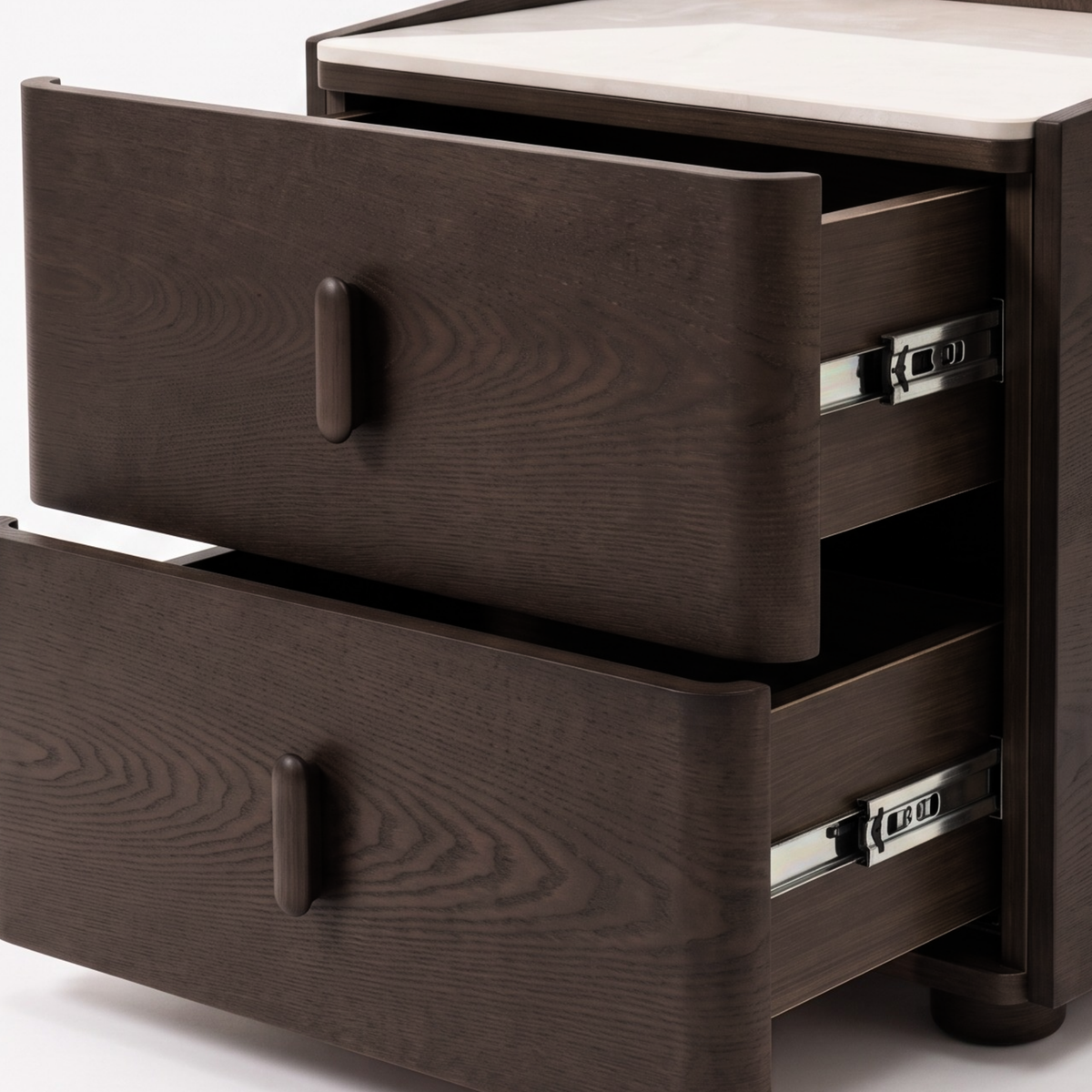 Close-up of a dark wooden nightstand with partially open drawers on a white background.