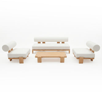Modica 5 Seater Aluminium Outdoor Sofa Set in White with a three-seat bench, two lounge chairs with bolster pillows, and a low slatted coffee table, all in light wood finish.