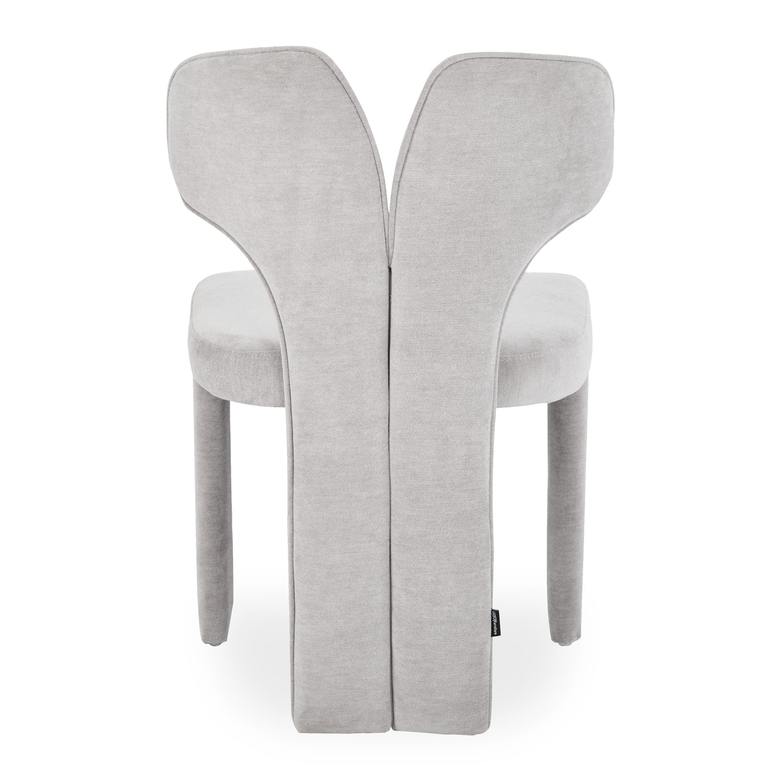 Back of light gray butterfly-inspired chair on white background