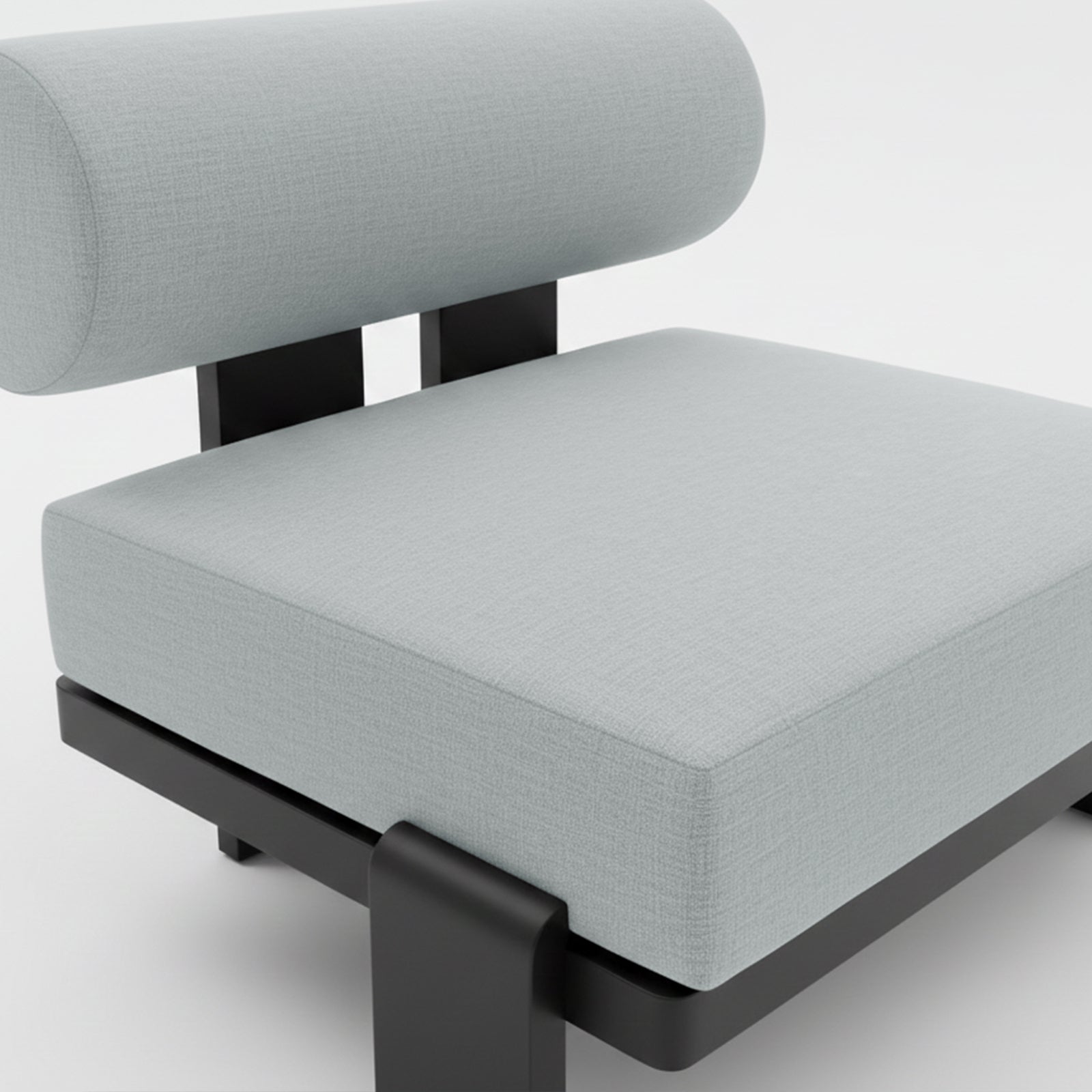 Close-up of the Modica 5 Seater Aluminium Outdoor Sofa Set in Black & Grey, highlighting the pale-gray upholstered seat with a cylindrical bolster backrest on a matte-black supported frame.