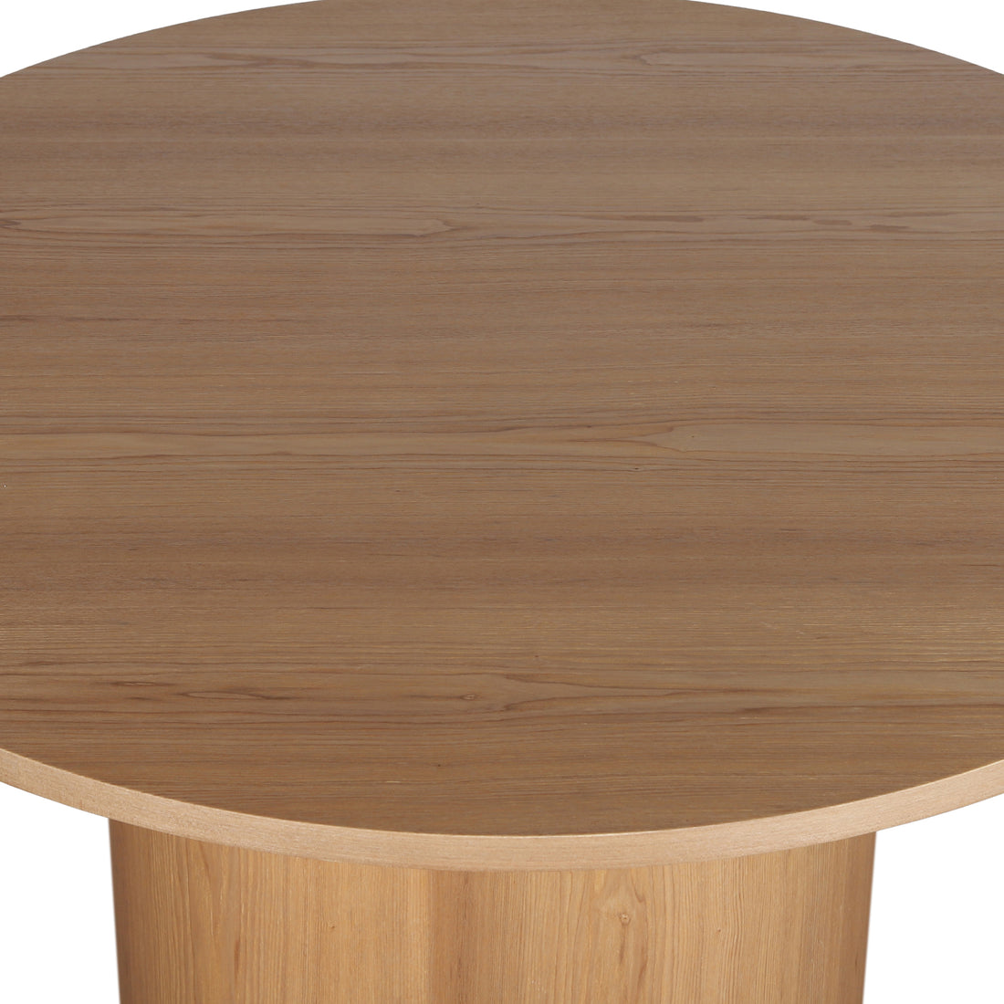 Cece 120cm Round Wooden Dining Table in Oak, showcasing its light wood grain and round tabletop with a central pedestal base. Ideal for compact dining spaces and seating four.
