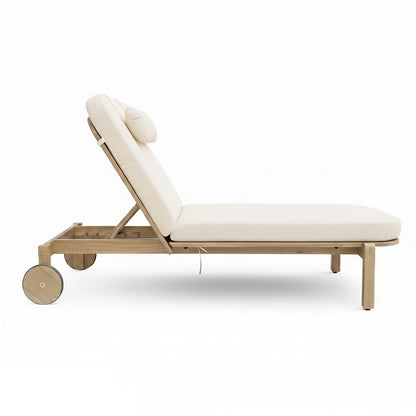 Zyra Hardwood Reclining Sun Lounger with Cushion in Cream featuring a light wood frame, adjustable backrest, small head pillow, and two wooden wheels for easy repositioning.