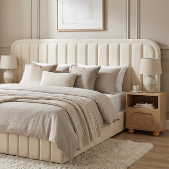 Bedroom with upholstered bed and headboard in lifestyle setting