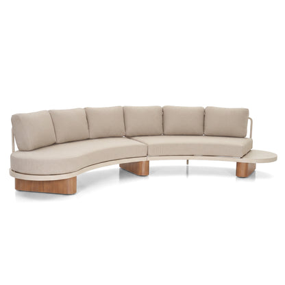 Full curved sectional sofa with attached end table on a white background