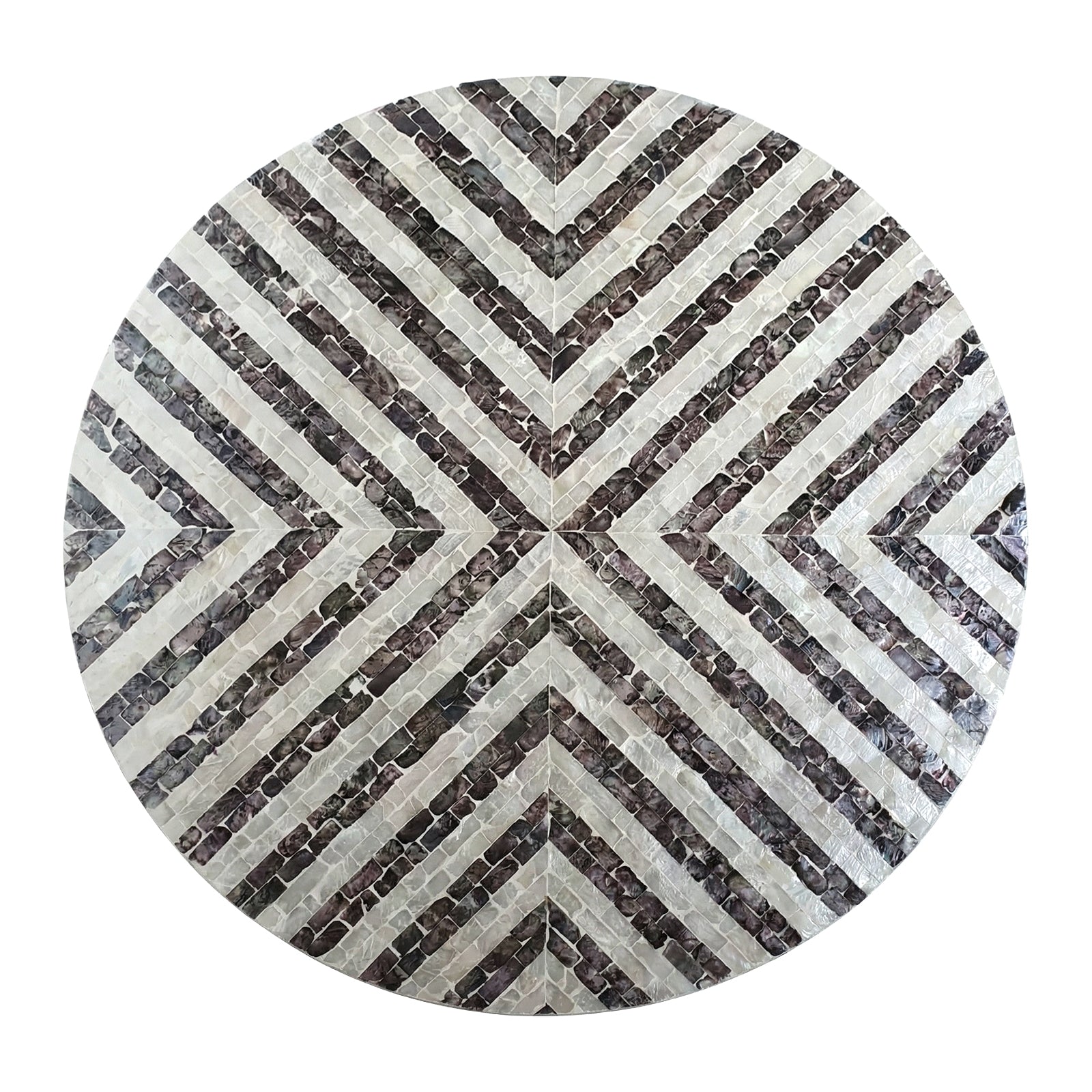 Round mosaic tabletop with black and white chevron pattern on white background