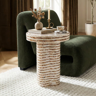Round mosaic side table in a living room setting