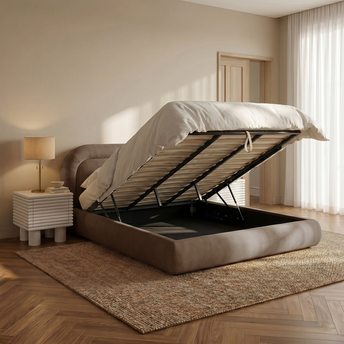 Upholstered storage bed with raised mattress platform in a neutral bedroom