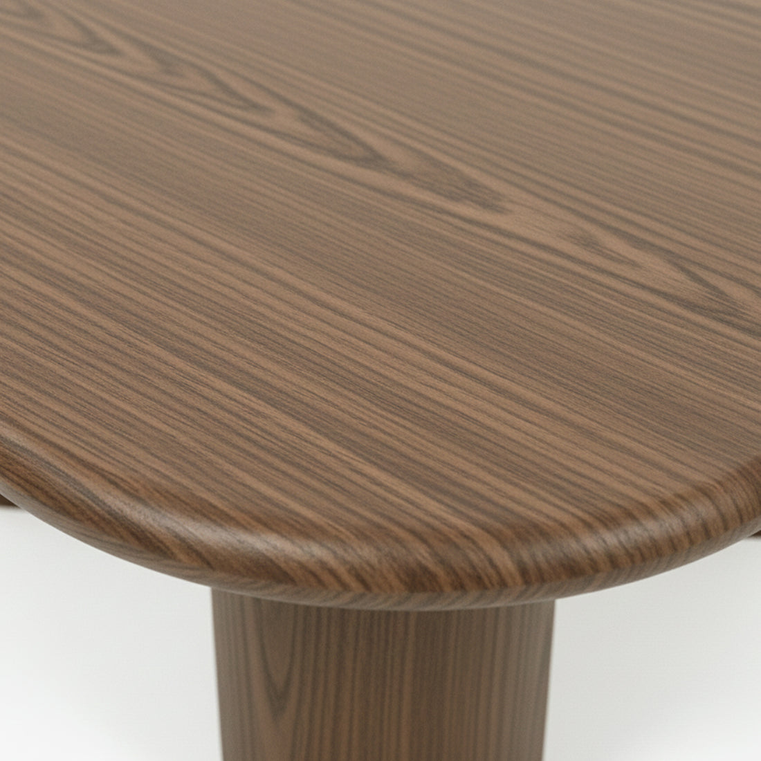Detail of rounded wooden table corner showing grain pattern
