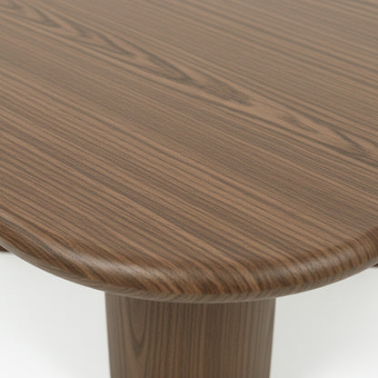 Detail of rounded wooden table corner showing grain pattern
