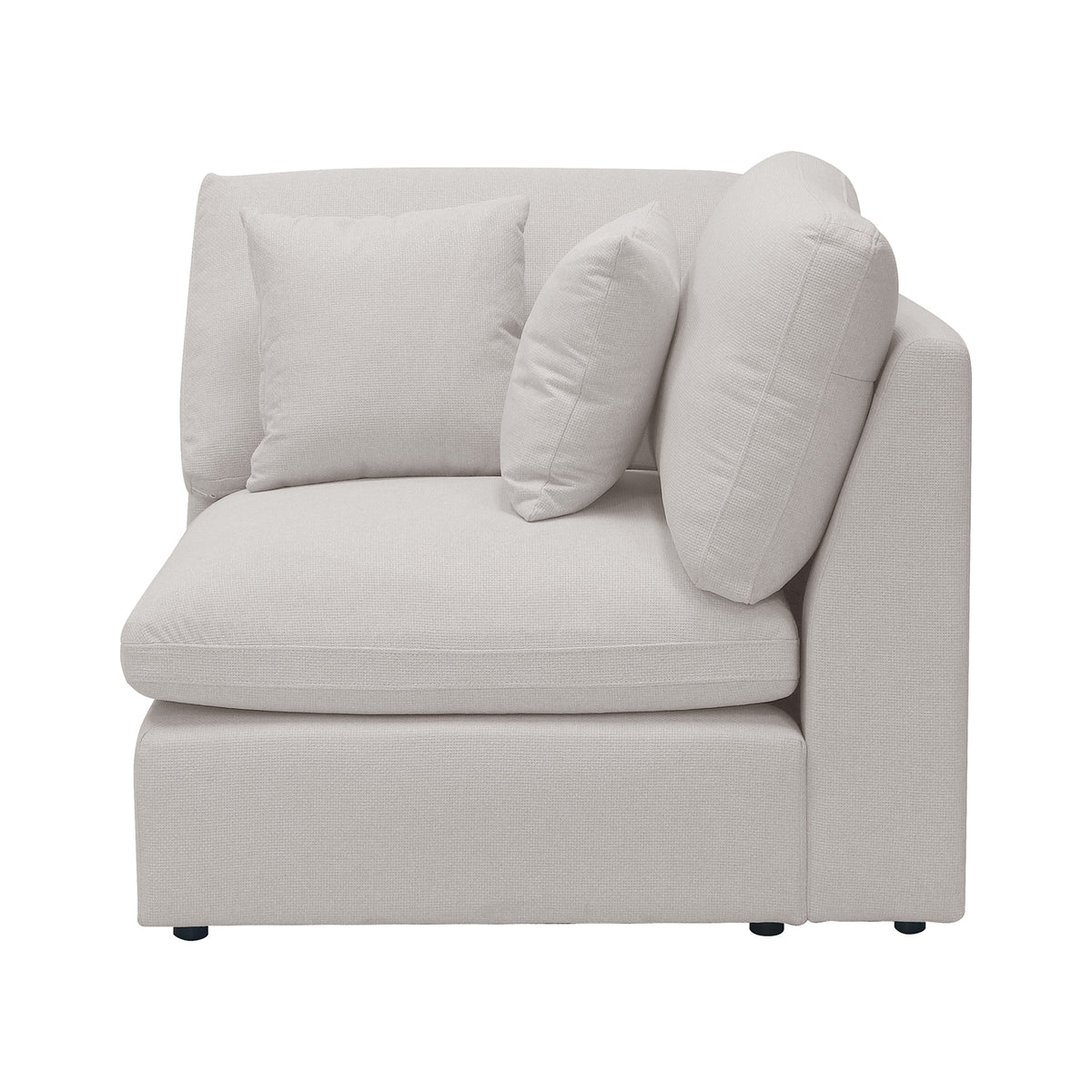 Light beige corner armchair with plush cushions on white background.